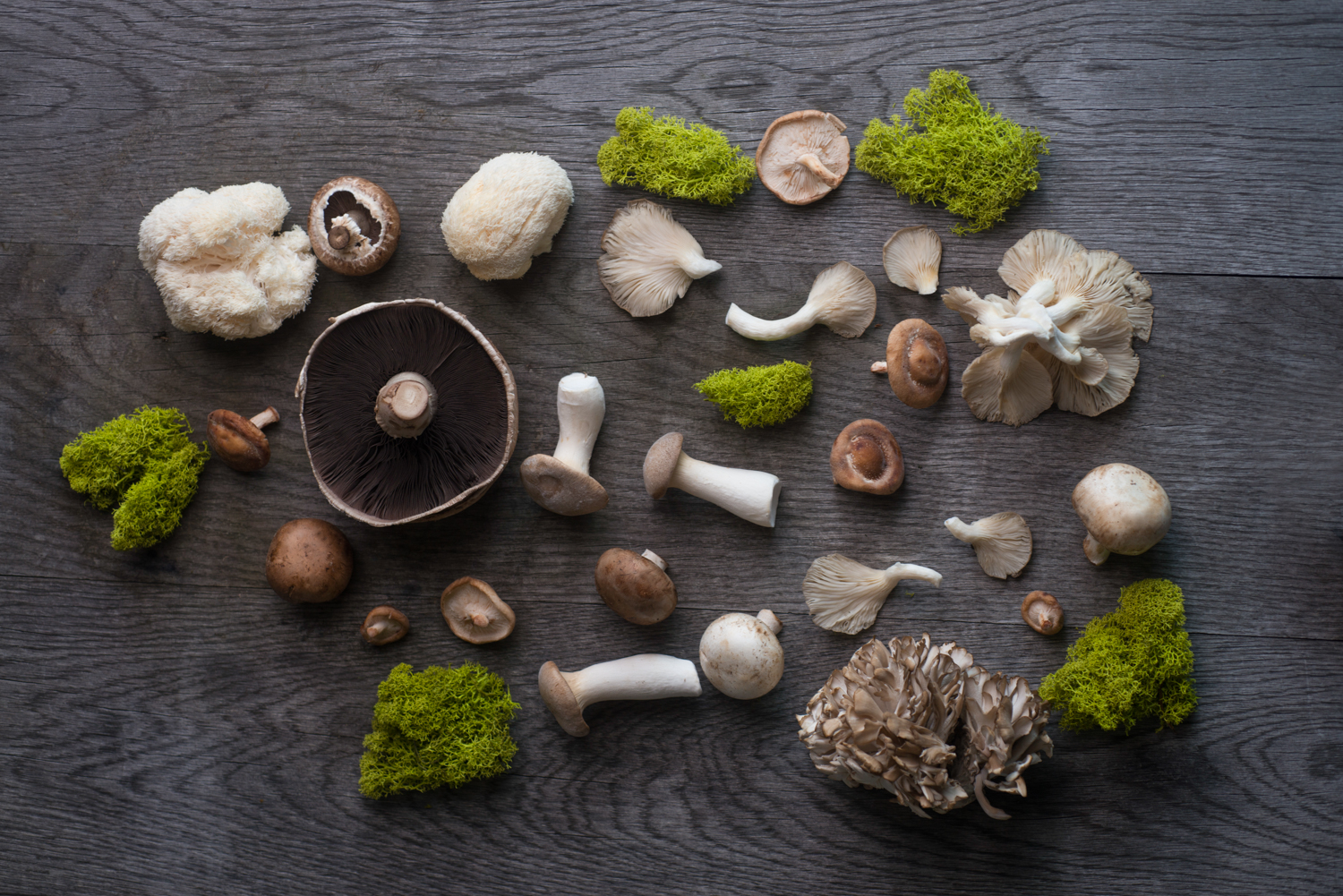 exotic mushrooms on a wood table