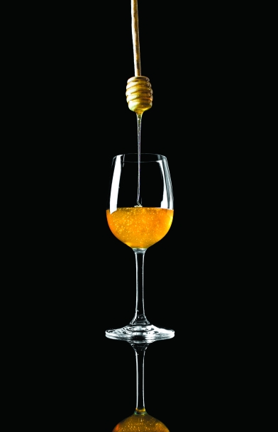 tasting honey in glass
