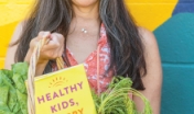 Dr. Elisa Song with her book Healthy Kids, Happy Kids